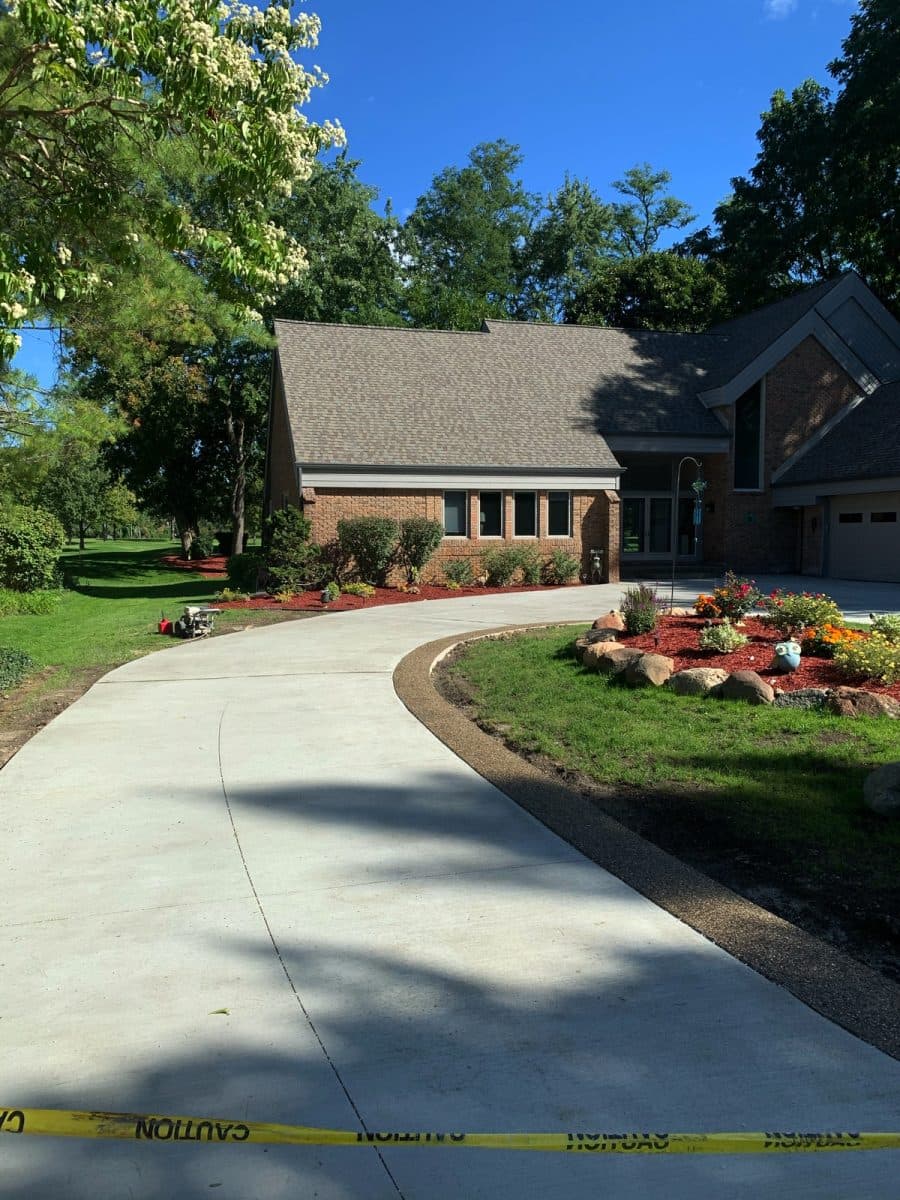 Custom-poured concrete driveway in London, Ontario by Concrete Driveways